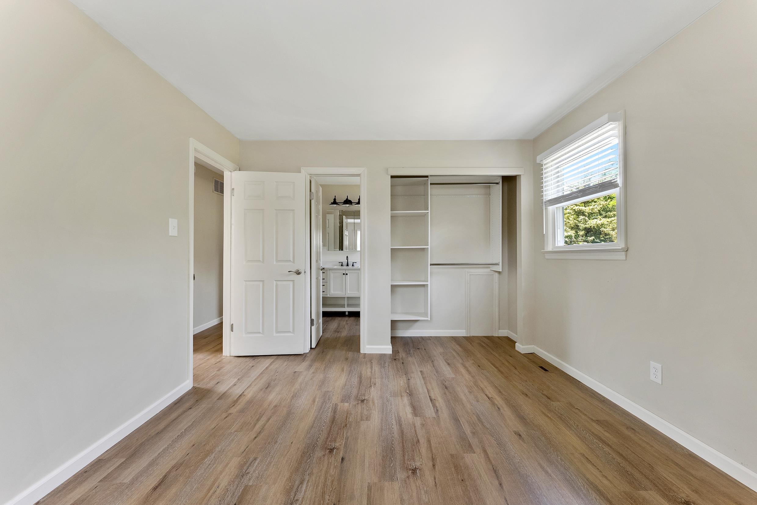 119 Butter Ocean View, NJ 08230 - Photo 12 of 29 wooden floor in an empty room with a window