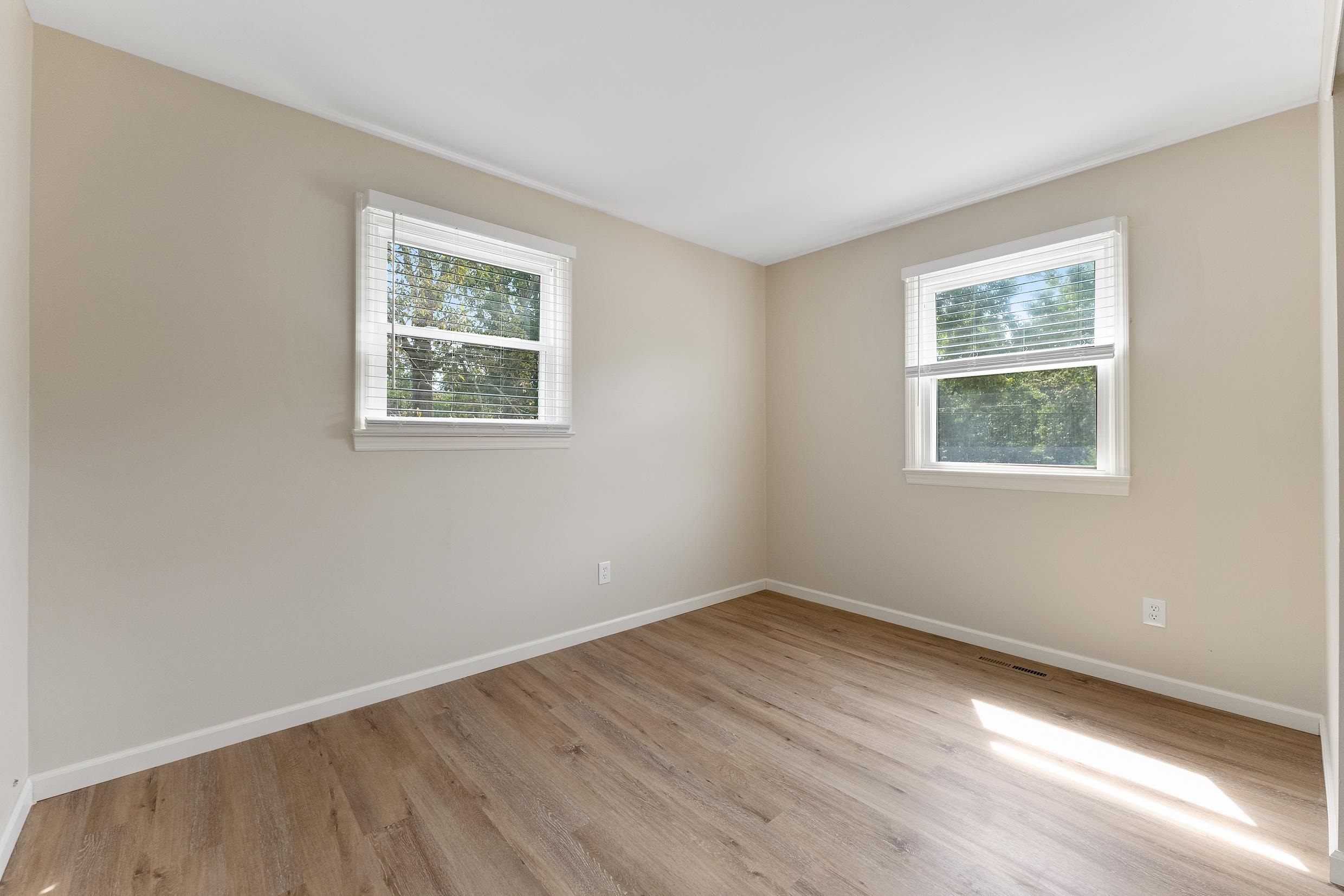 119 Butter Ocean View, NJ 08230 - Photo 13 of 29 a view of a big room with wooden floor and windows