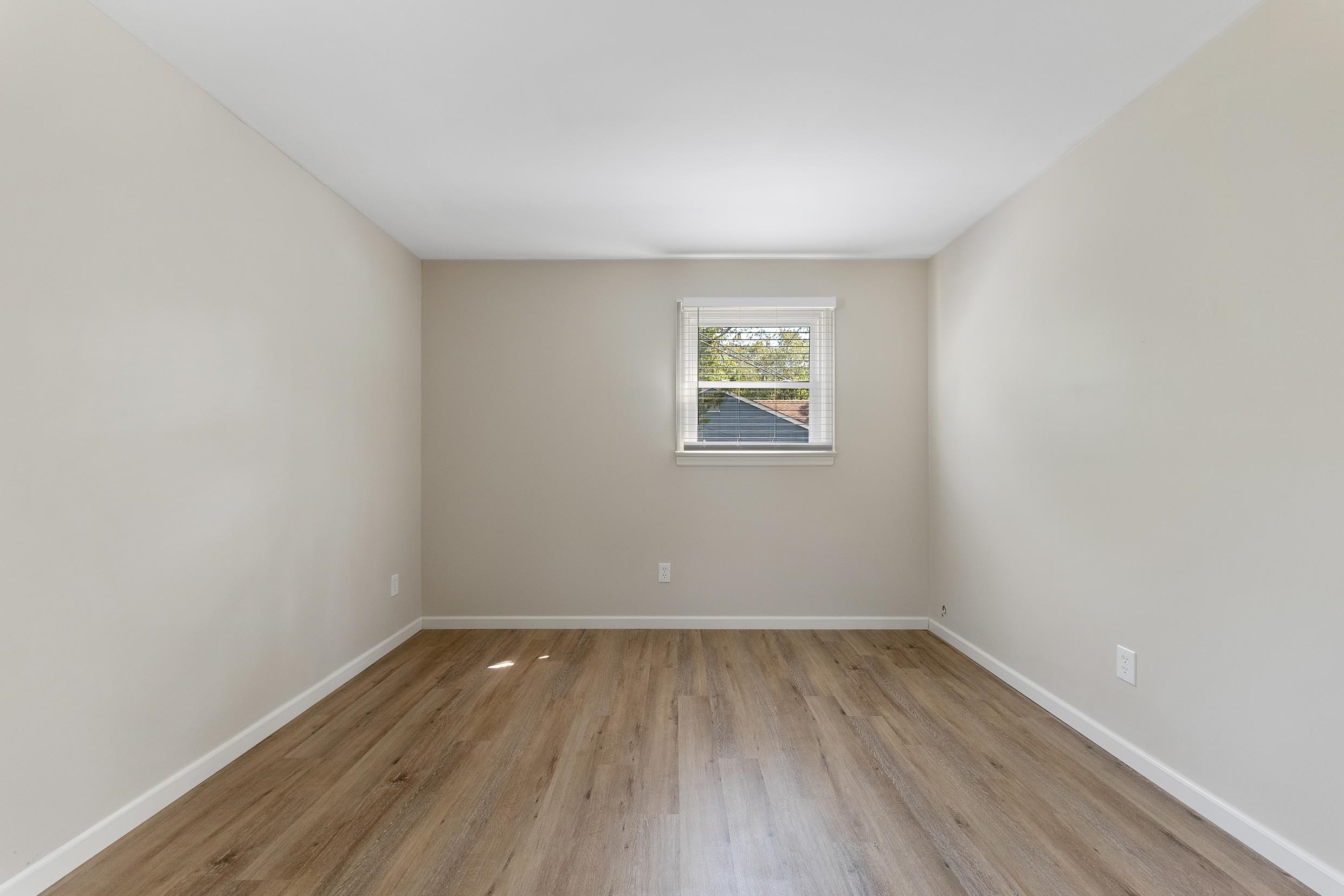 119 Butter Ocean View, NJ 08230 - Photo 15 of 29 wooden floor in an empty room with a window