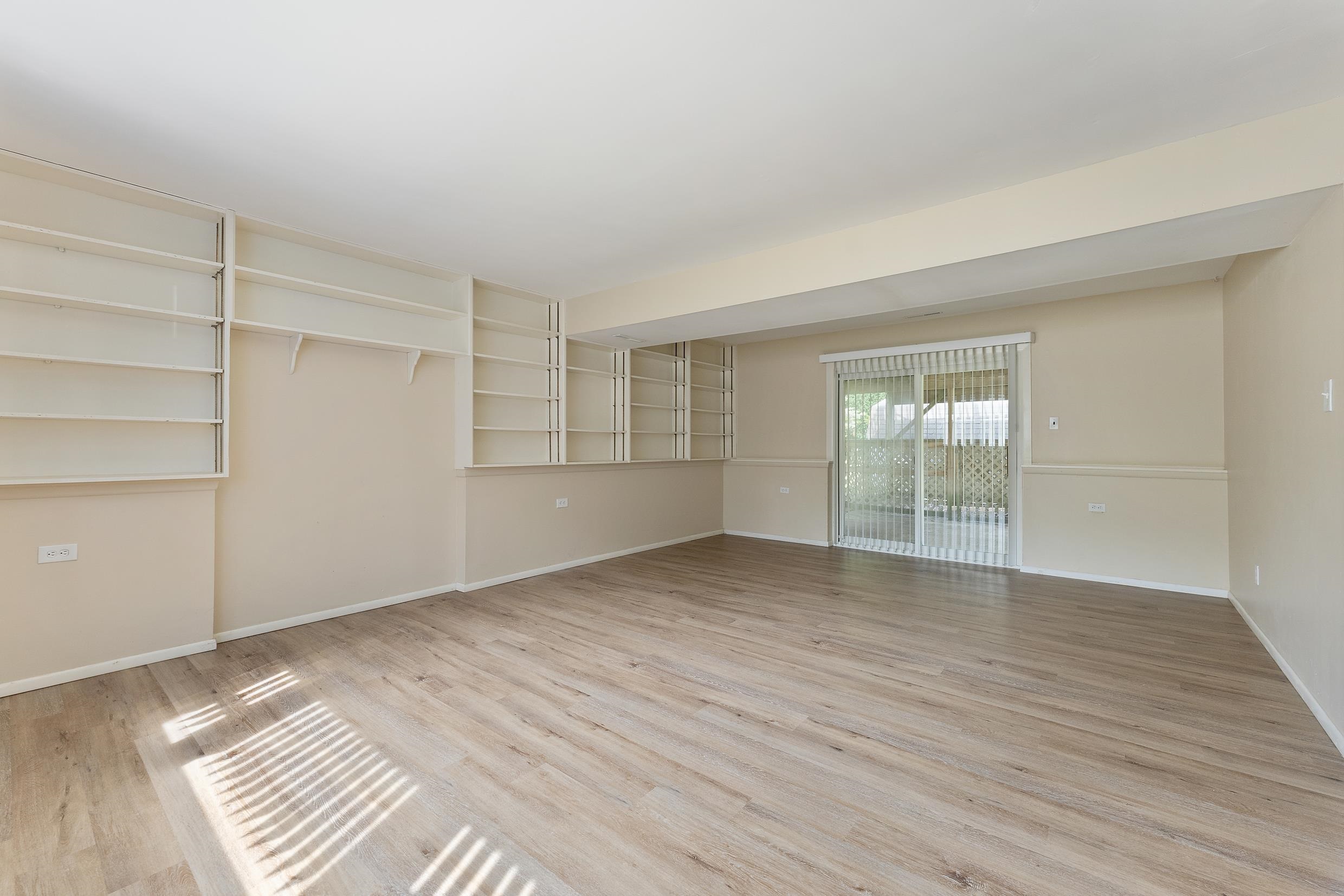 119 Butter Ocean View, NJ 08230 - Photo 19 of 29 a view of an empty room with wooden floor and a window
