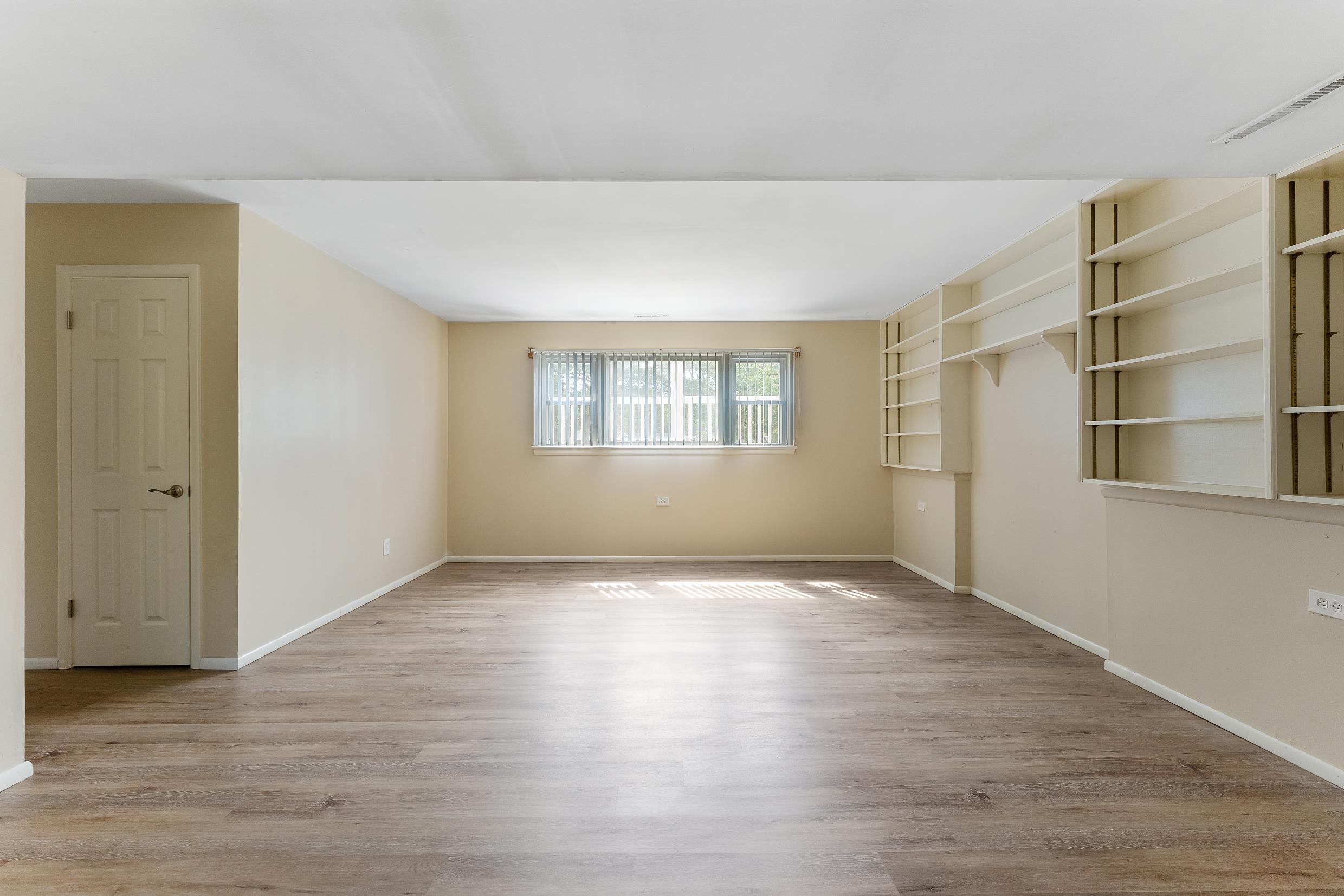 119 Butter Ocean View, NJ 08230 - Photo 20 of 29 a view of an empty room with wooden floor and a window