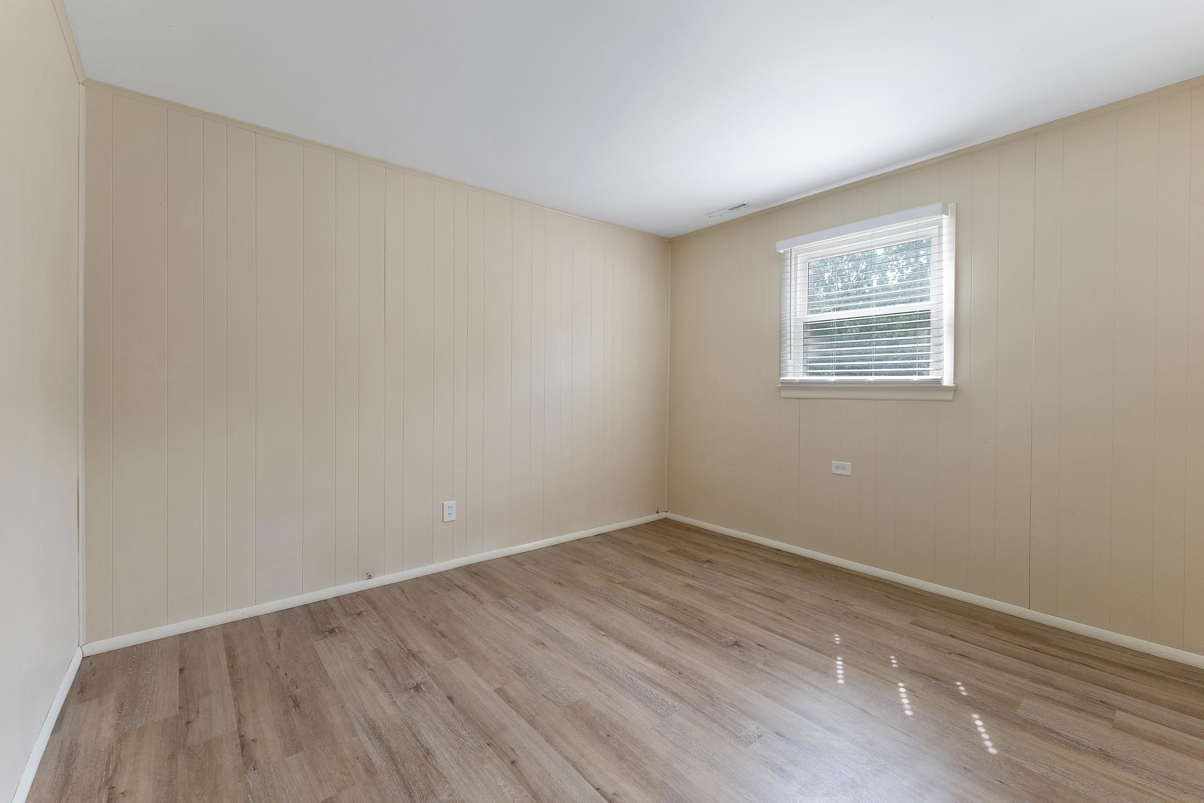 119 Butter Ocean View, NJ 08230 - Photo 23 of 29 wooden floor in an empty room with a window