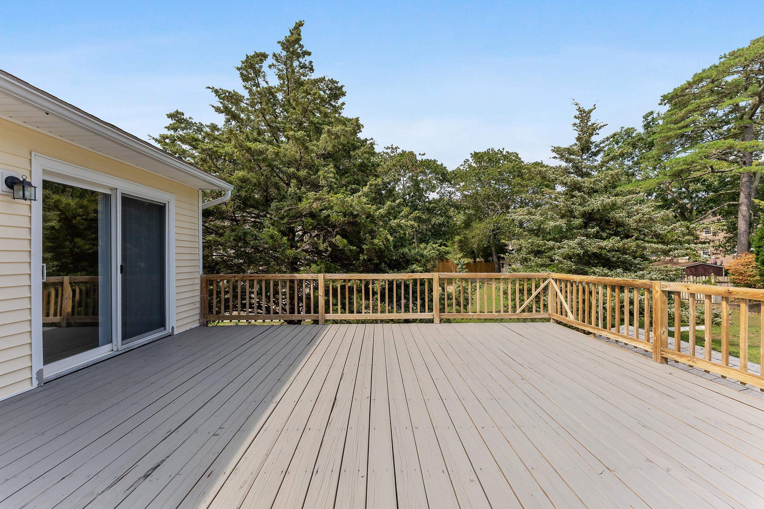 119 Butter Ocean View, NJ 08230 - Photo 26 of 29 a view of balcony with wooden floor and fence