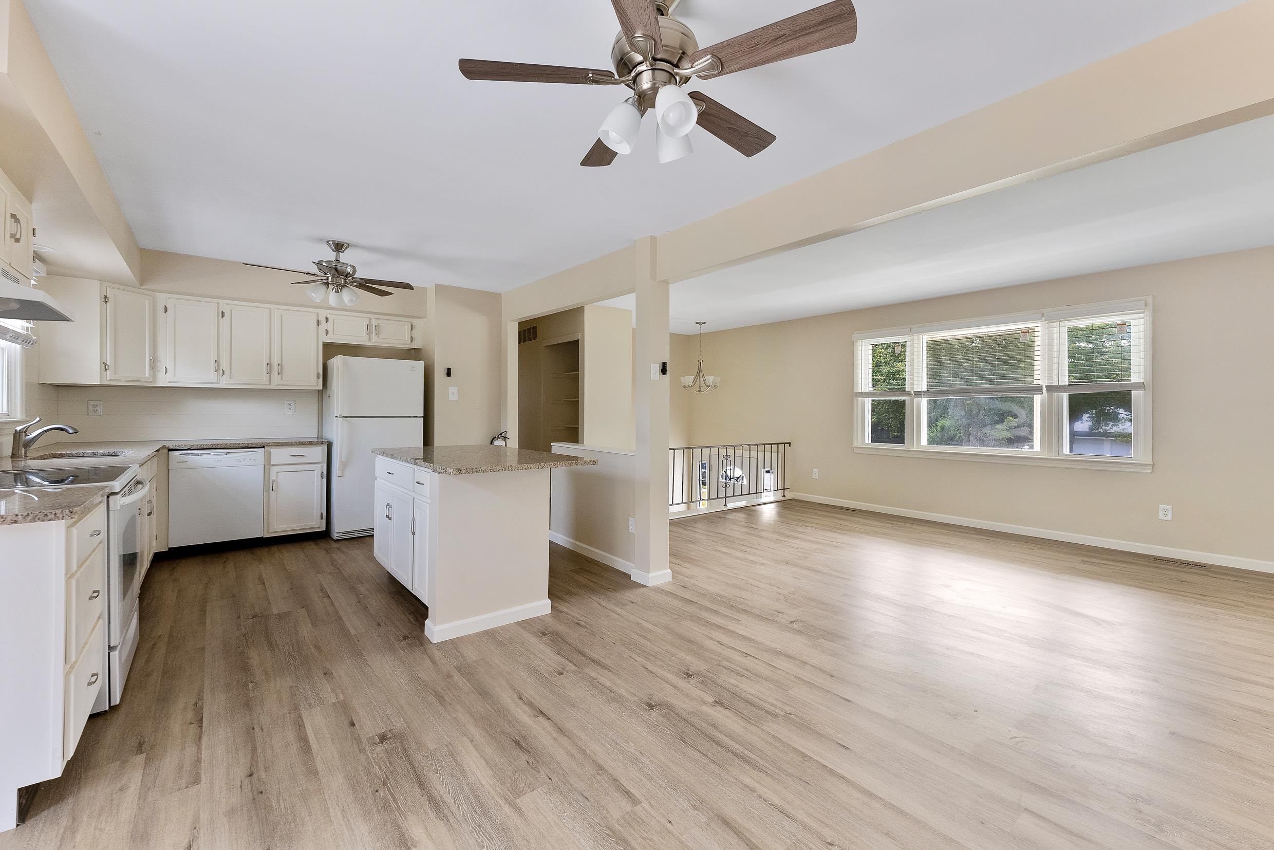 119 Butter Ocean View, NJ 08230 - Photo 4 of 29 a view of a kitchen with furniture and wooden floor