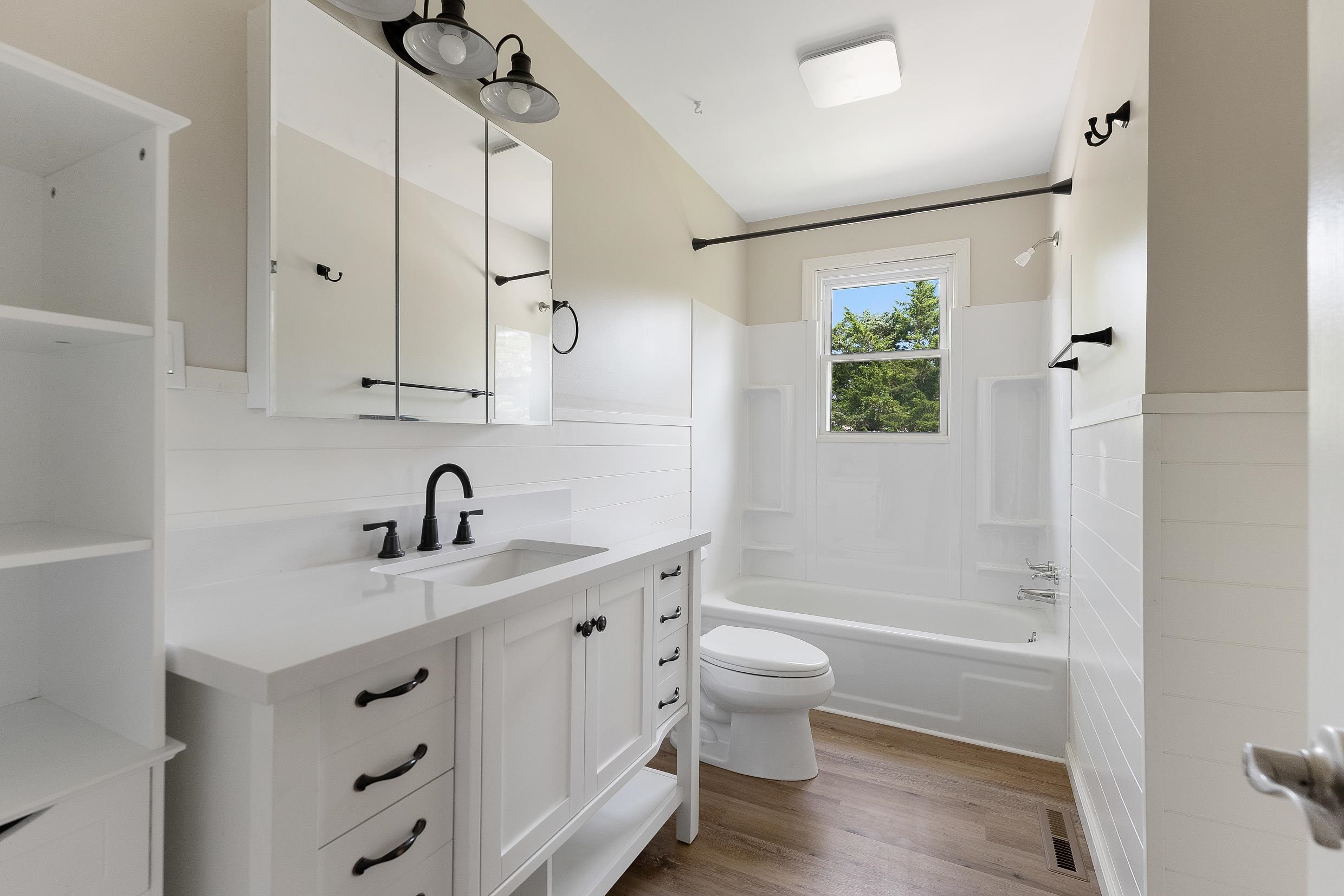 119 Butter Ocean View, NJ 08230 - Photo 10 of 29 a bathroom with a bathtub shower sink vanity and toilet