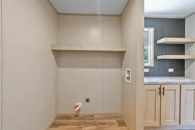 a view of staircase with white walls