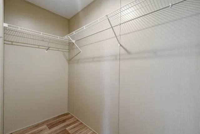 a view of a room with racks on the wall