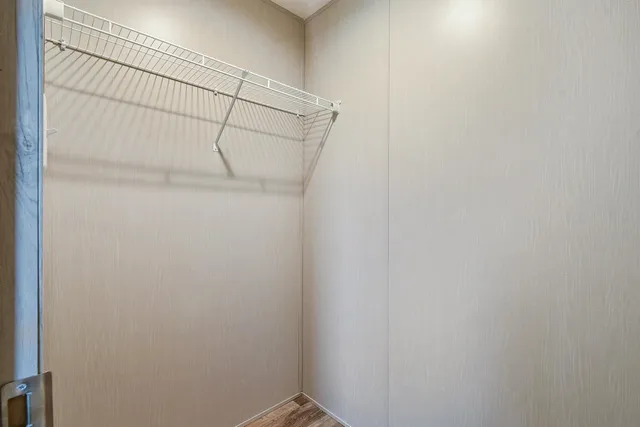 a view of a room with racks on the wall