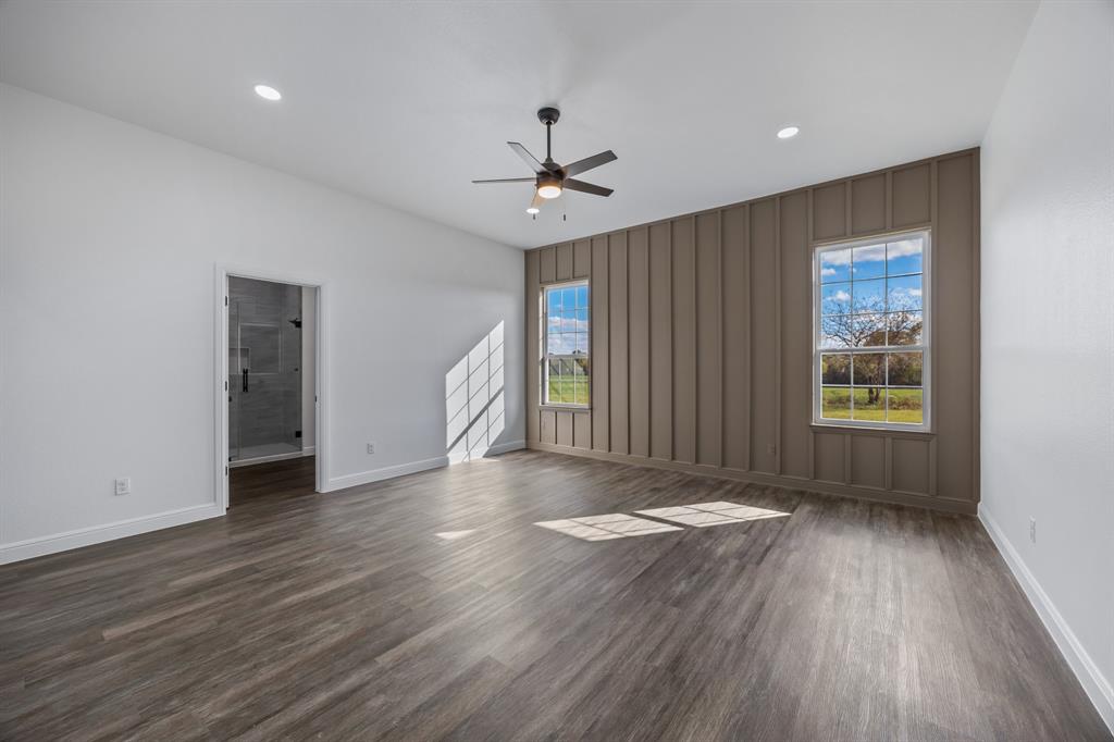 4651 Grand View Drive Athens, TX 75752 - Photo 11 of 23 wooden floor in an empty room with a window