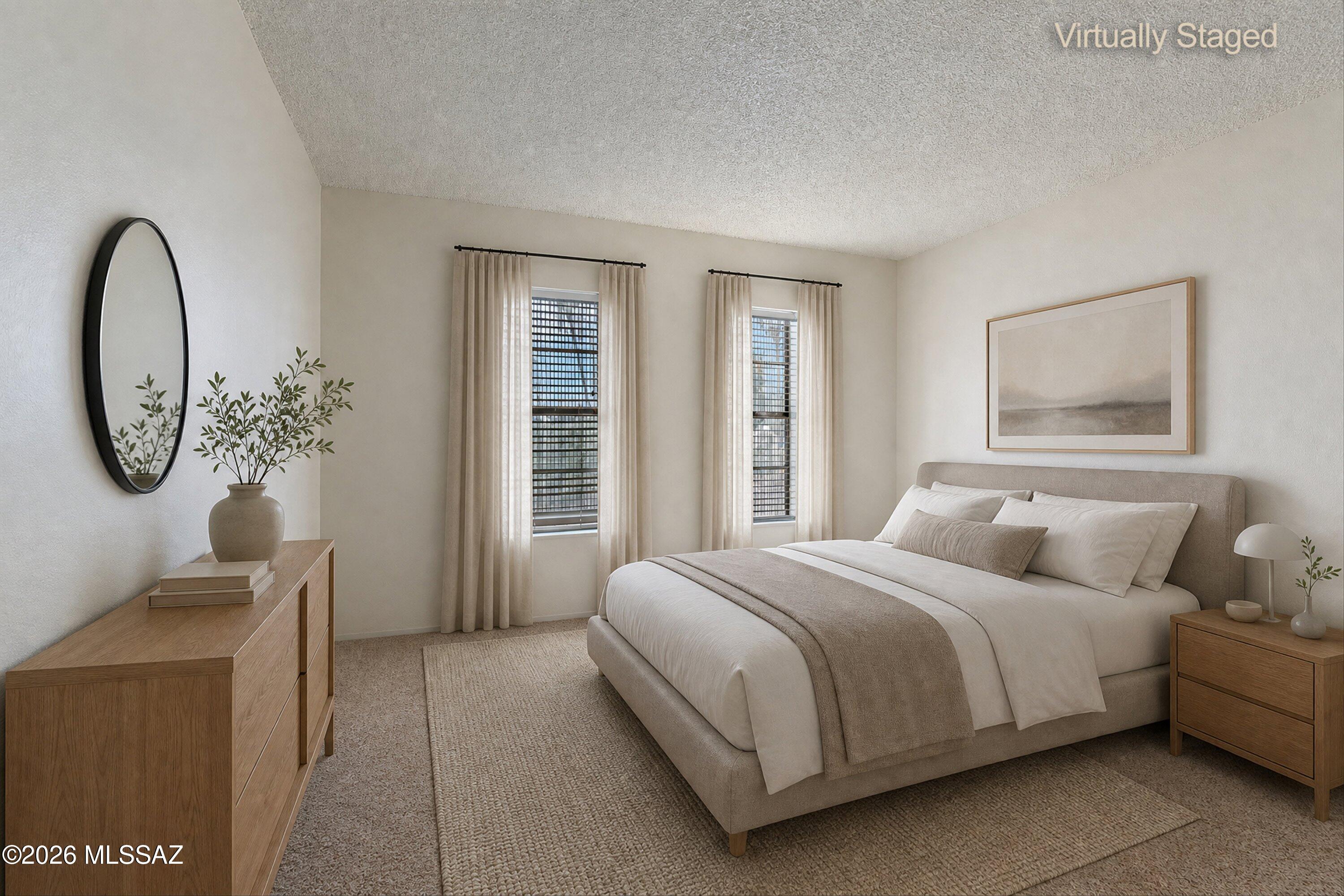 660 East River Road, Unit J Tucson, AZ 85704 - Photo 11 of 27 Primary Bedroom with Furniture