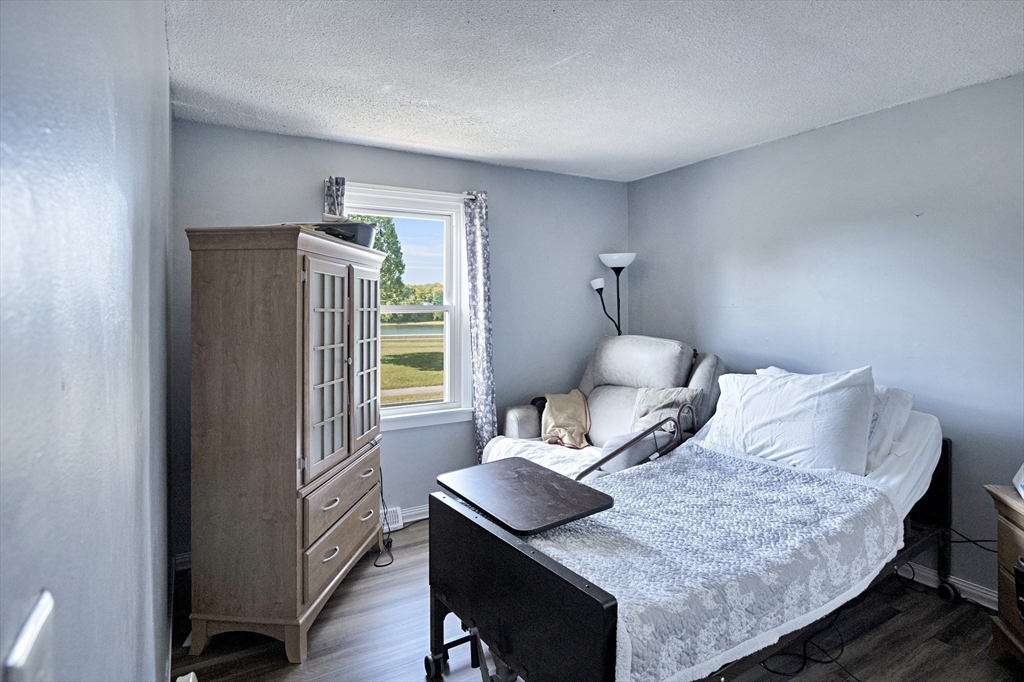 485 Riverside Road Springfield, MA 01107 - Photo 24 of 33 a bedroom with furniture and a window