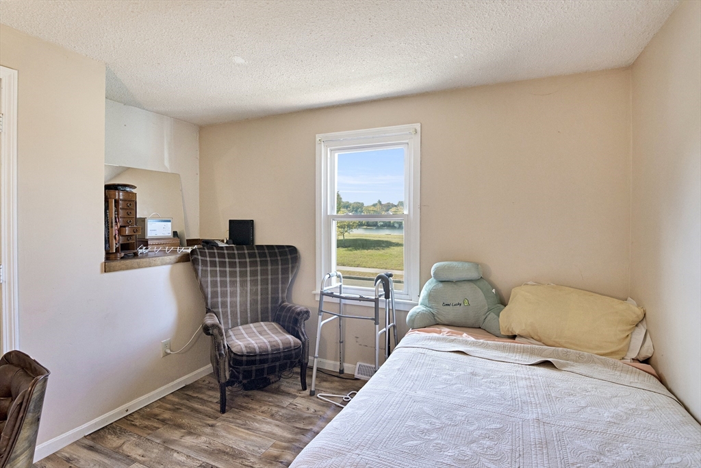 485 Riverside Road Springfield, MA 01107 - Photo 25 of 33 a bedroom with furniture and a window