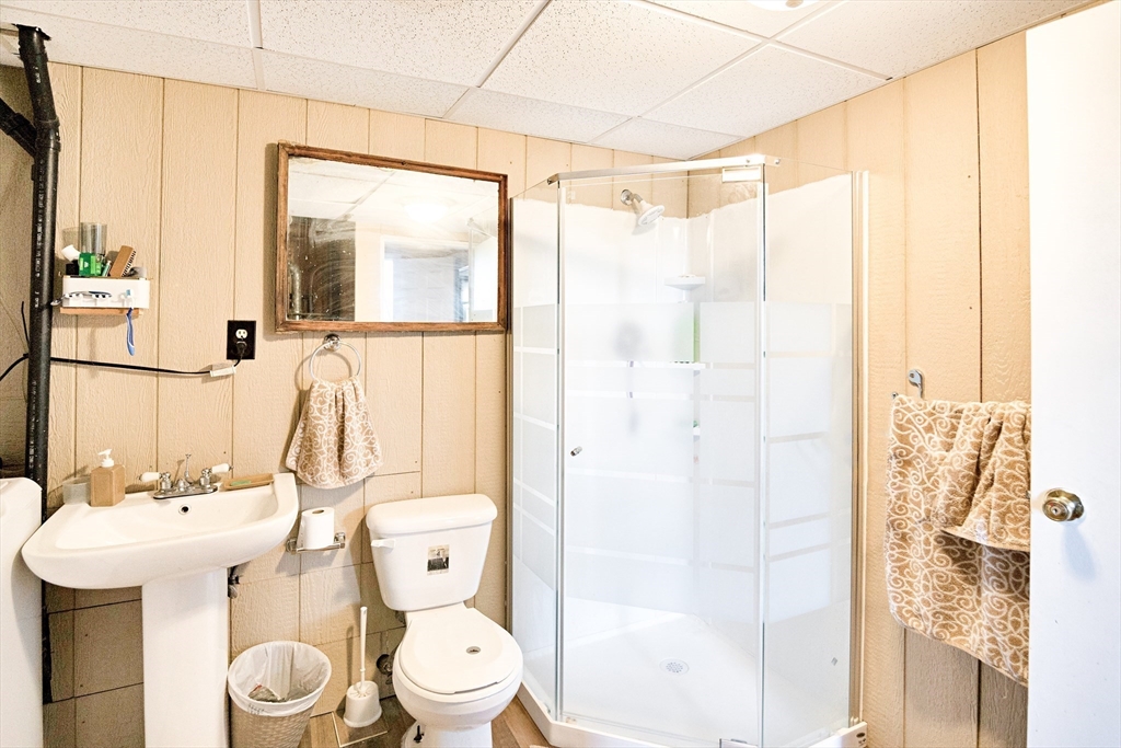 485 Riverside Road Springfield, MA 01107 - Photo 26 of 33 a bathroom with a sink toilet and shower