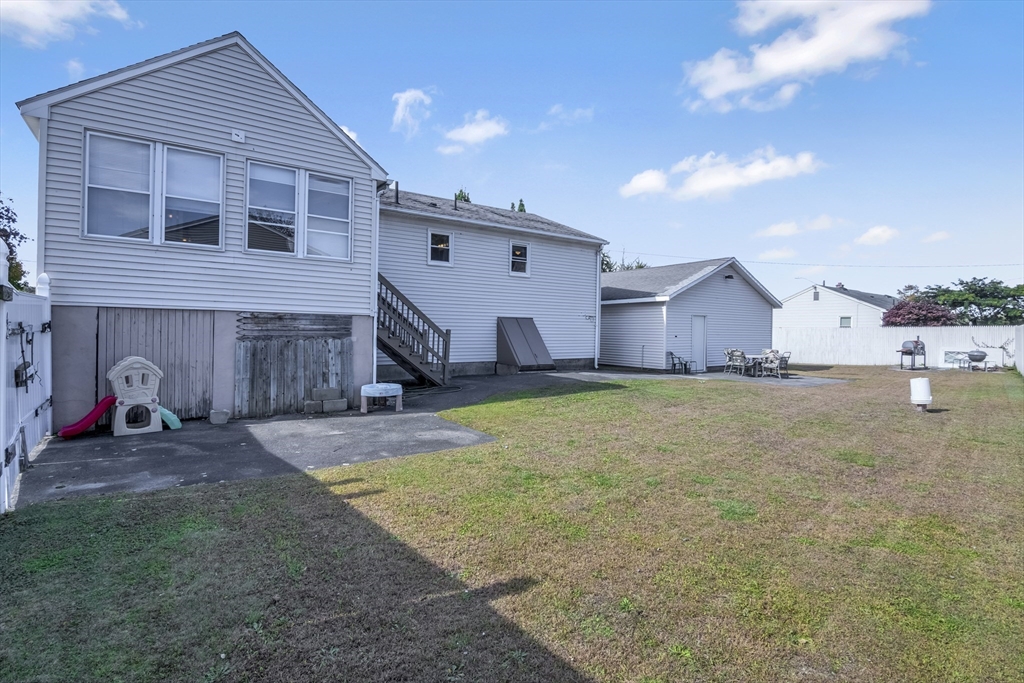 485 Riverside Road Springfield, MA 01107 - Photo 4 of 33 a view of a house with a yard