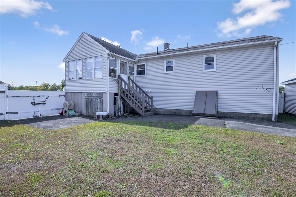 485 Riverside Road Springfield, MA 01107 - Photo 5 of 33 a house view with a garden space