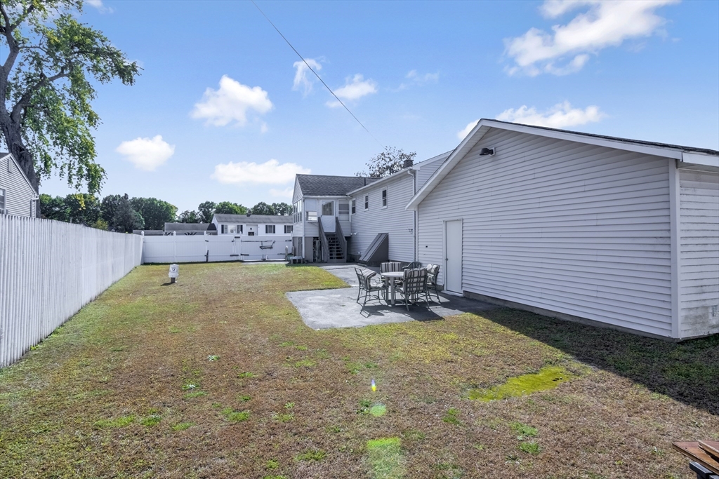 485 Riverside Road Springfield, MA 01107 - Photo 7 of 33 a view of a house with swimming pool and sitting area