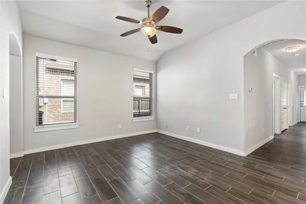 a view of a kitchen with a sink and a kitchen view