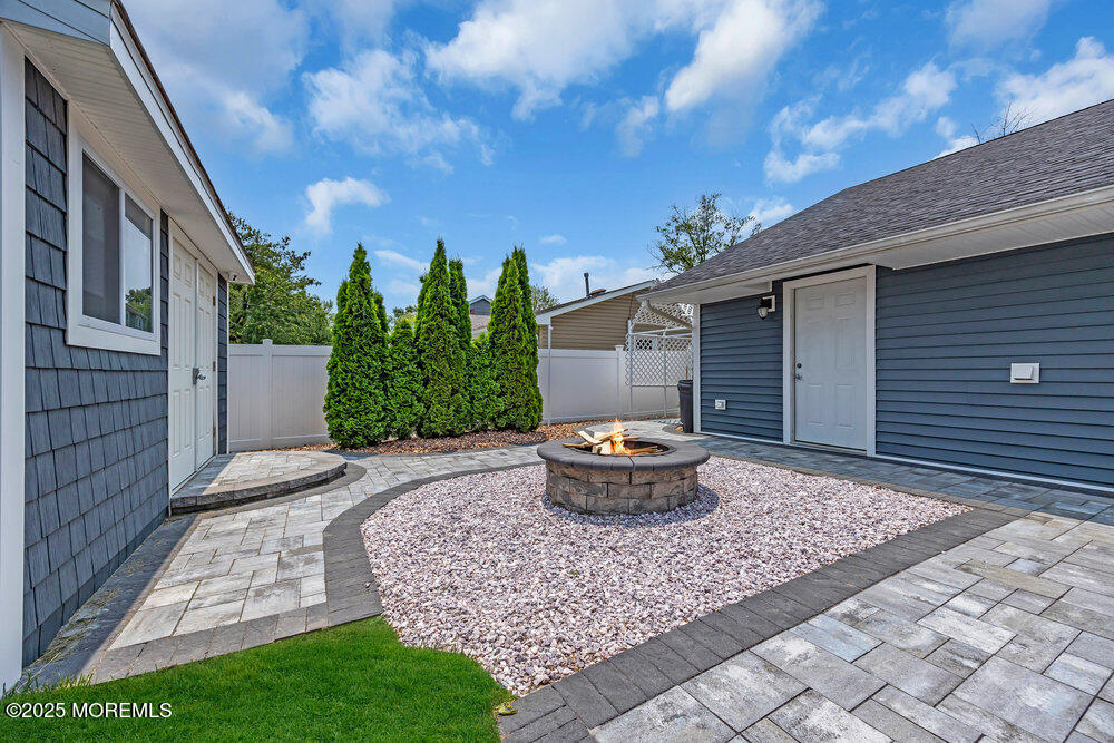 590 Lloyd Road Aberdeen, NJ 07747 - Photo 32 of 71 a front view of house with yard and entertaining space