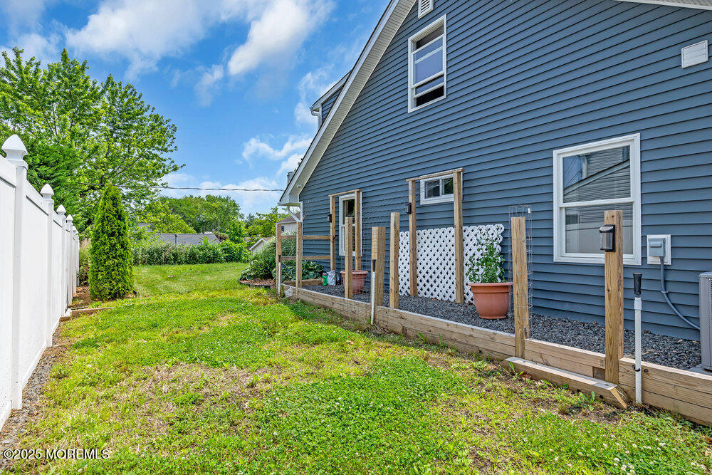 590 Lloyd Road Aberdeen, NJ 07747 - Photo 41 of 71 a view of a house with backyard and porch