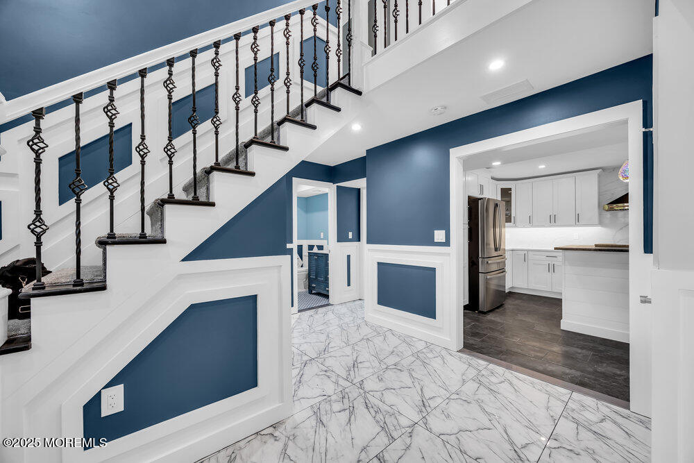 590 Lloyd Road Aberdeen, NJ 07747 - Photo 57 of 71 a view of entryway and hall with wooden floor