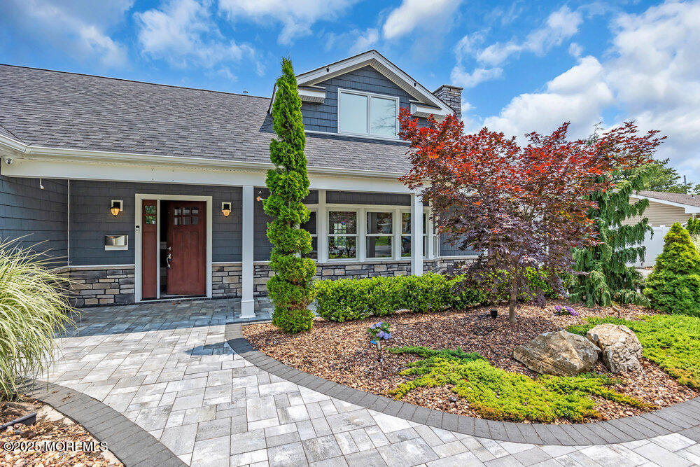 590 Lloyd Road Aberdeen, NJ 07747 - Photo 7 of 71 a front view of a house with garden