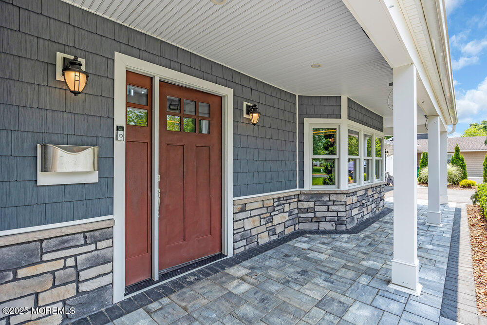 590 Lloyd Road Aberdeen, NJ 07747 - Photo 8 of 71 a view of front door of house with stairs