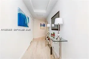 a view of a hallway with workspace and a hallway