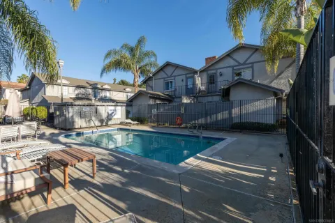 a view of house with outdoor space and sitting area