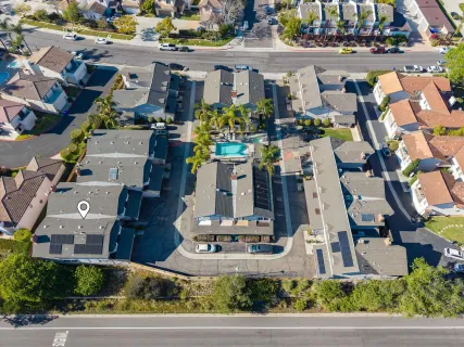 a front view of a building with street view