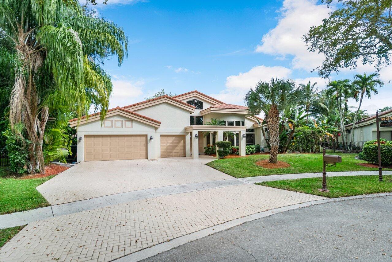 4898 Northwest 25th Way Boca Raton, FL 33434 - Photo 1 of 42 001-4898Northwest25thWay-BocaRaton-FL-33