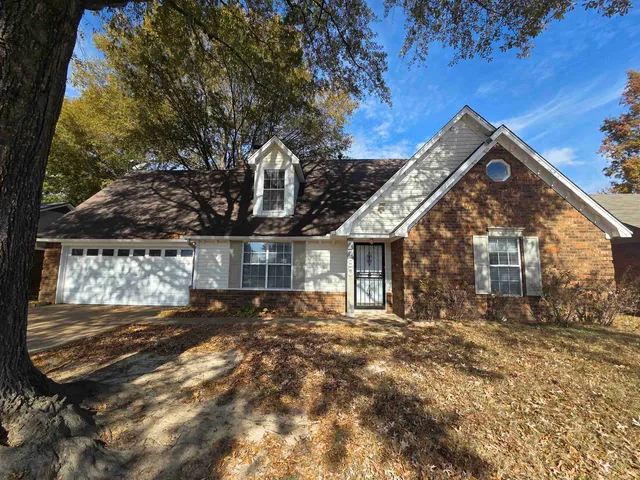 a front view of house with yard