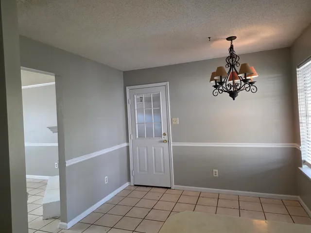 a room with window and stairs