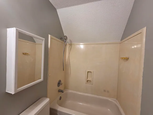 a bathroom with a bathtub