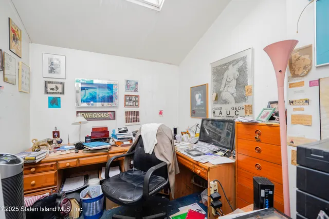 a room with furniture and a lamp