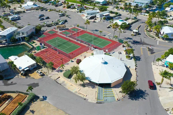 an aerial view of a houses with yard