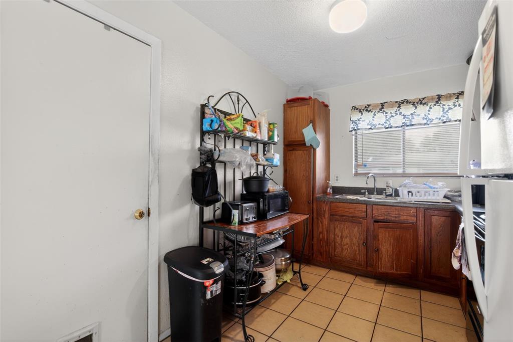 8821 Southeast 89th Place Ocala, FL 34472 - Photo 15 of 30 a room with furniture a window and a view of living room