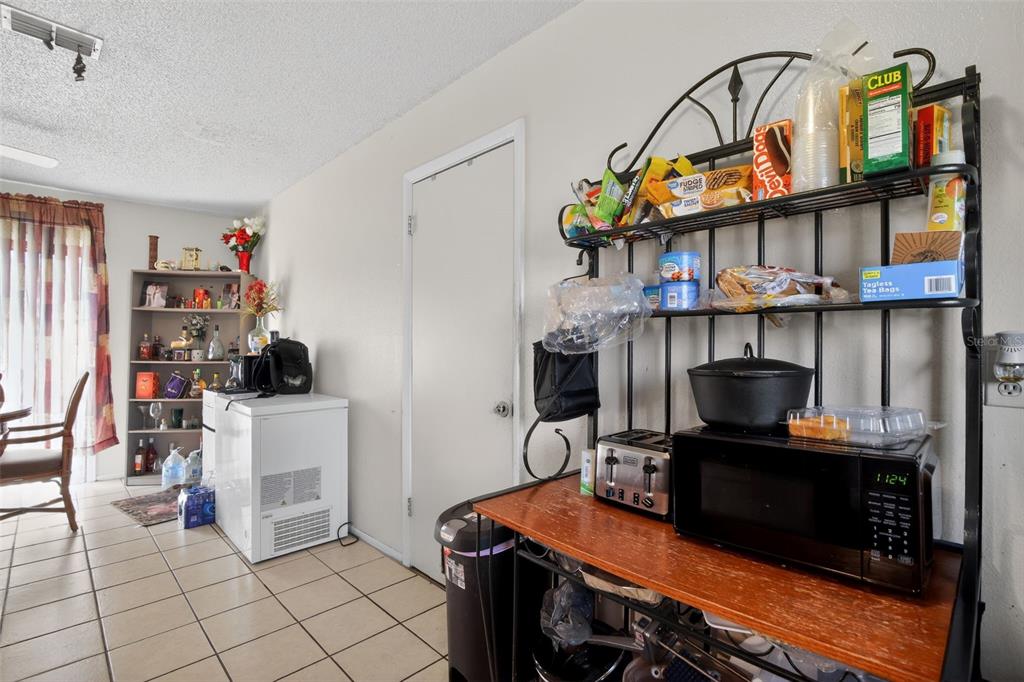 8821 Southeast 89th Place Ocala, FL 34472 - Photo 16 of 30 a view of a workspace with furniture