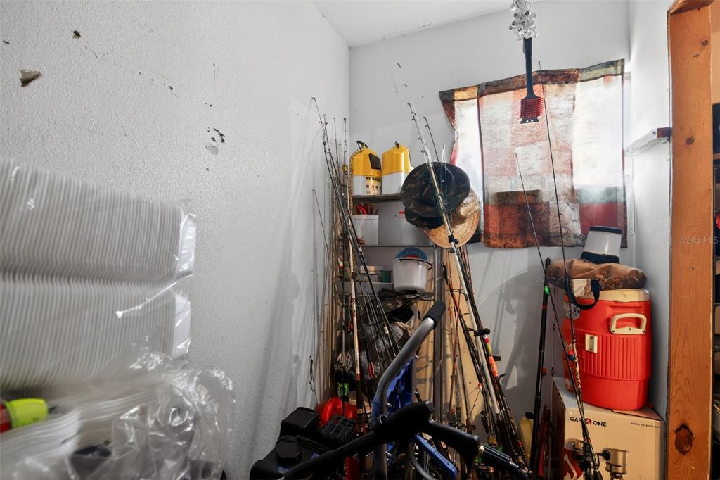 8821 Southeast 89th Place Ocala, FL 34472 - Photo 27 of 30 a view of a room with gym equipment