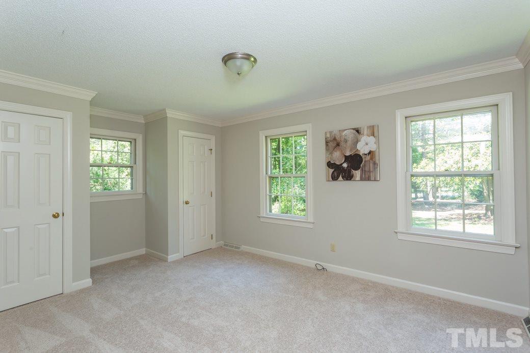 4004 Southall Road Raleigh, NC 27604 - Photo 22 of 25 an empty room with windows