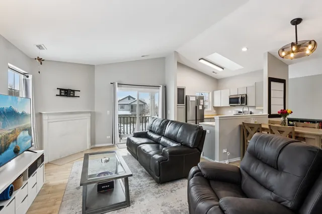 a living room with furniture and a table