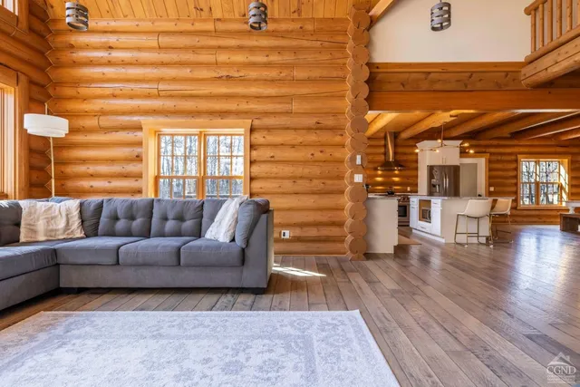 a bathroom with a sink a toilet a shower and a mirror