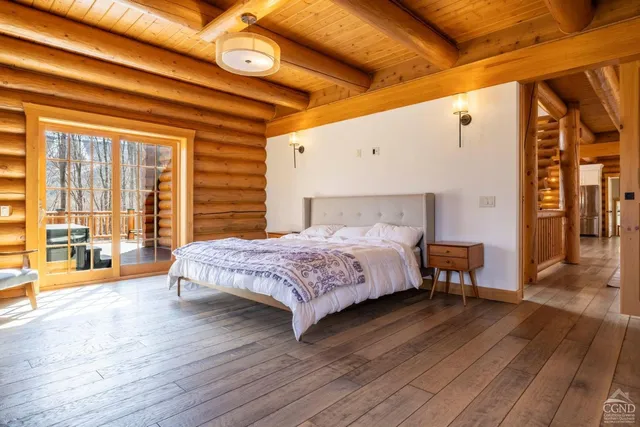 a view of a living room and wooden floor