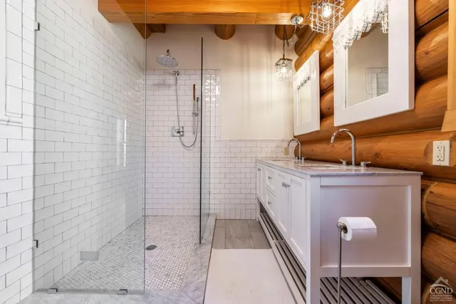 a view of an entryway with wooden floor and door