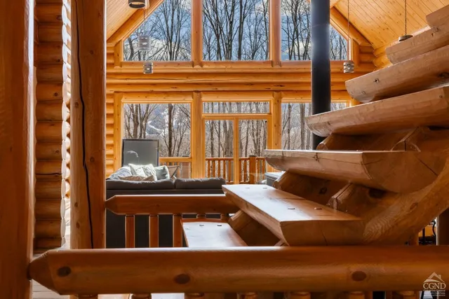 a view of a house with a small yard