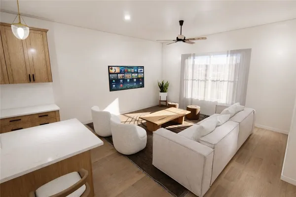 a living room with furniture and a window