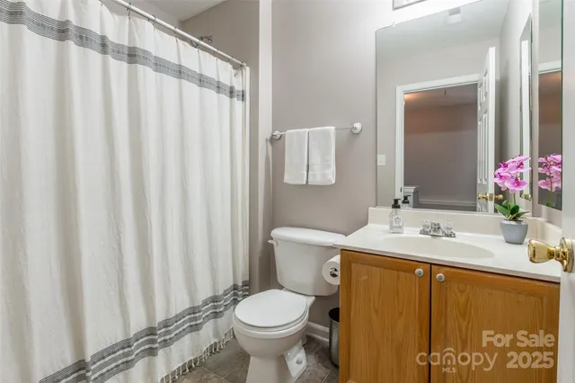 a bathroom with a sink and toilet