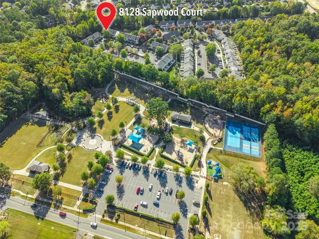 a view of swimming pool with a yard