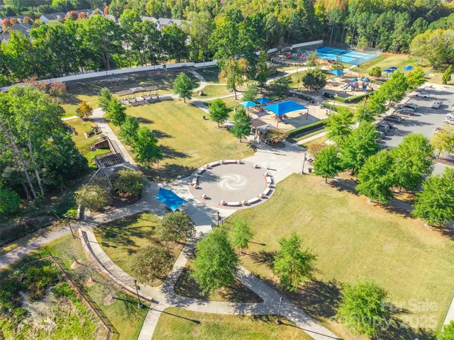 a view of swimming pool with a patio