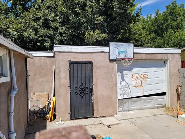 a view of a street with an outdoor seating