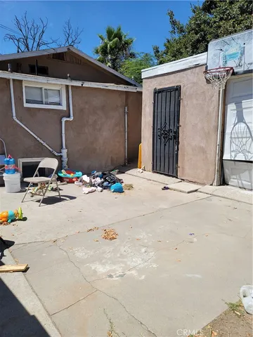 a view of small space with wooden fence